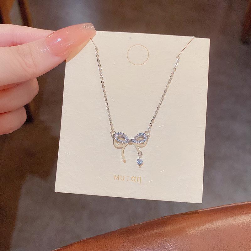 

Korean Double-Layer Titanium Steel Bow Necklace with Zircon