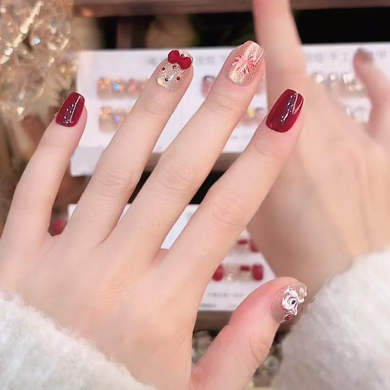 

Festive Burgundy Whitening Nail Stickers: Fireworks & Lion Dance Design for Autumn/Winter - High-End Wearable & Finished Fake Nails Glue Version