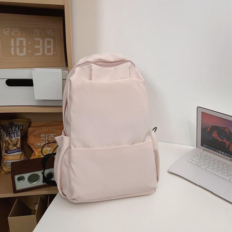 Schoolbag new large-capacity high-value junior high school student casual schoolbag Japanese and Korean version solid color fashionable simple