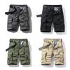 Pantaloni scurți utilitari micro-elastici cu buzunare multiple, pantaloni scurți casual drepți largi, pantaloni trendy până la genunchi, pantaloni medii, pantaloni de culoare uni mărimi mari