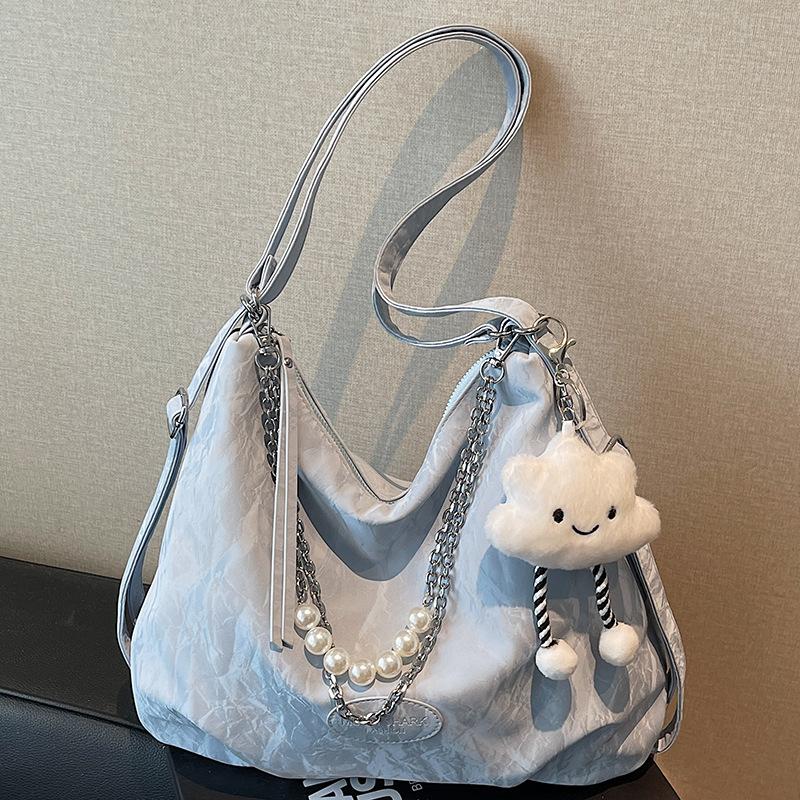 Urban simple large-capacity bag female summer new college students class shoulder women's bag high value messenger bag