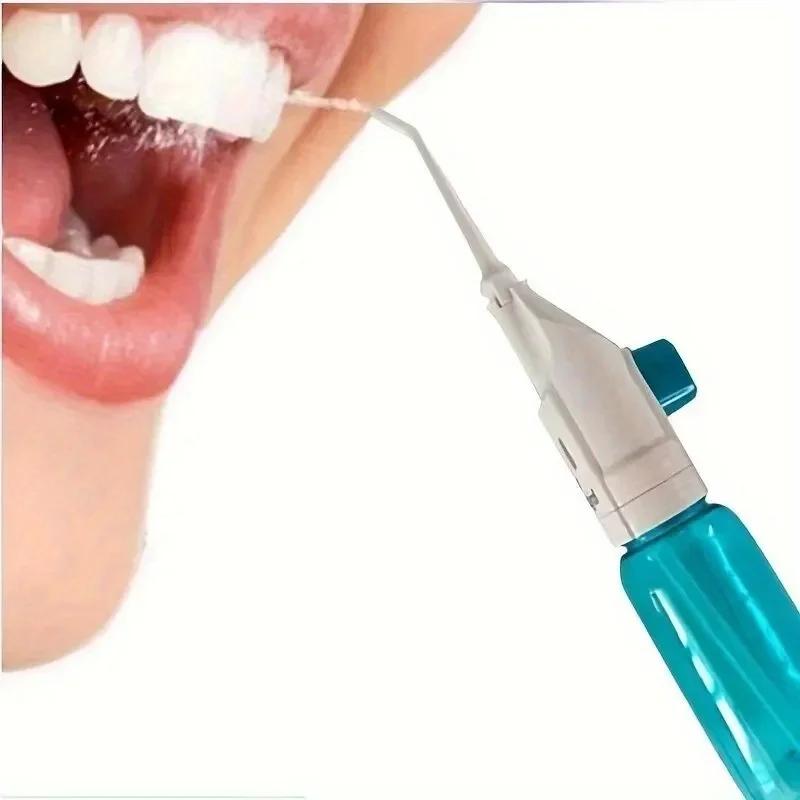 Portable high-pressure oral irrigator - manual tooth cleaner with grip, nozzle attachment for gum health
