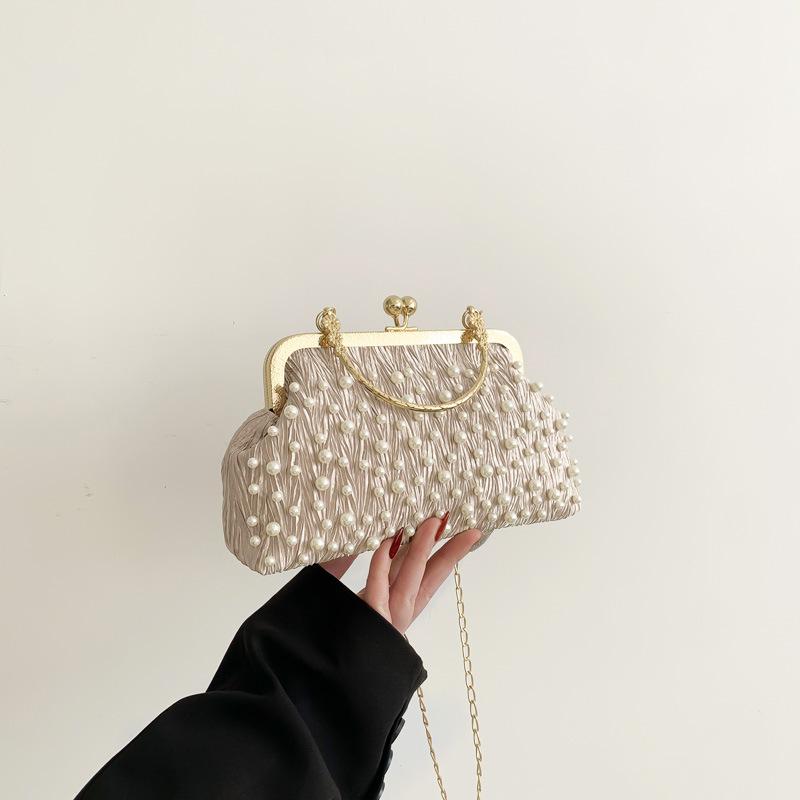 

Нежная и модная сумочка с жемчужным замком 2025 ранняя весна новая универсальная сумка через плечо на цепочке в стиле ins корейская версия