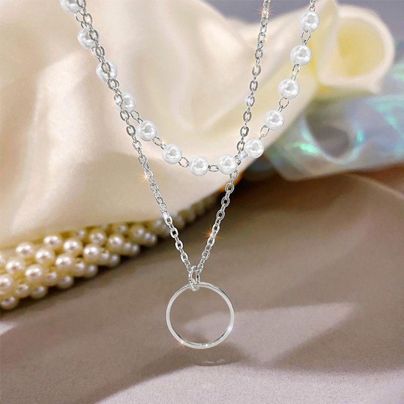 

Double-Layer Pearl Necklace: 2023 Trendy, Chic Design with Luxurious Clavicle Chain