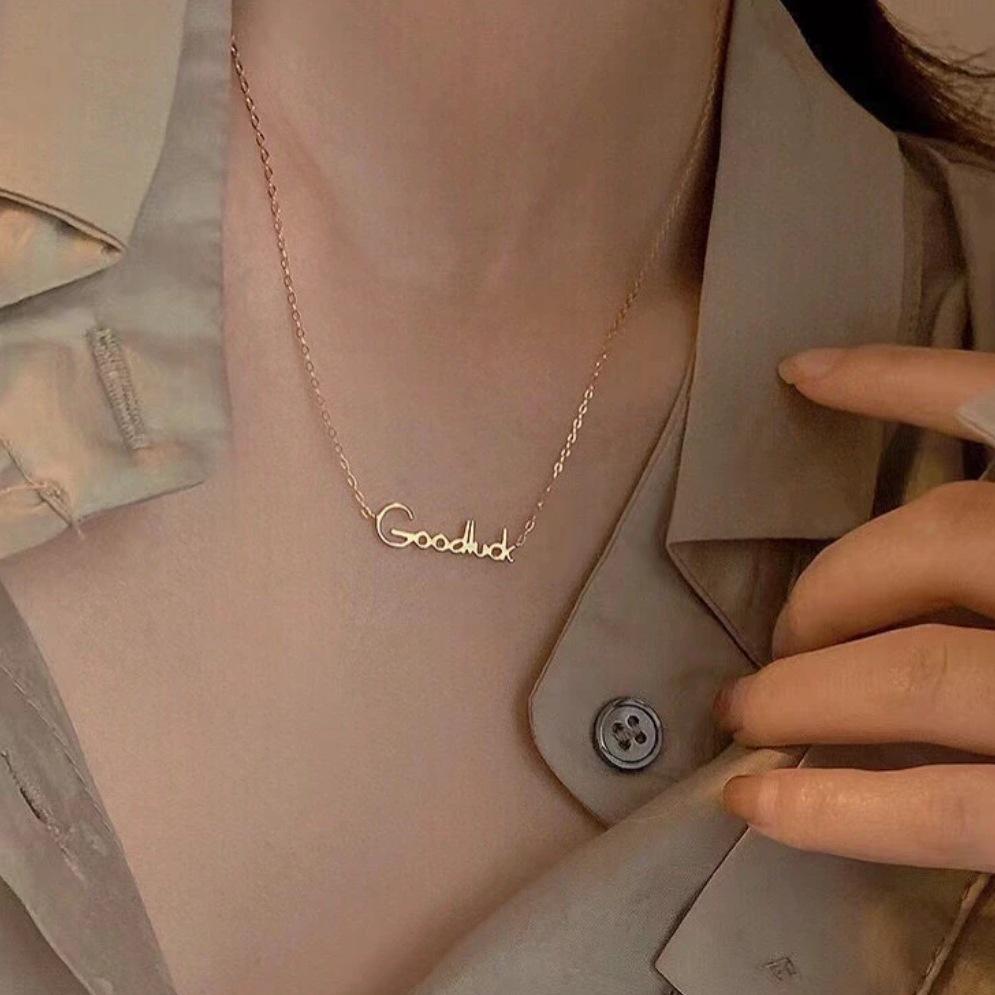 Korean Style Good Luck Pendant Necklace: Fashionable Titanium Steel Collarbone Chain with English Letter for Girls