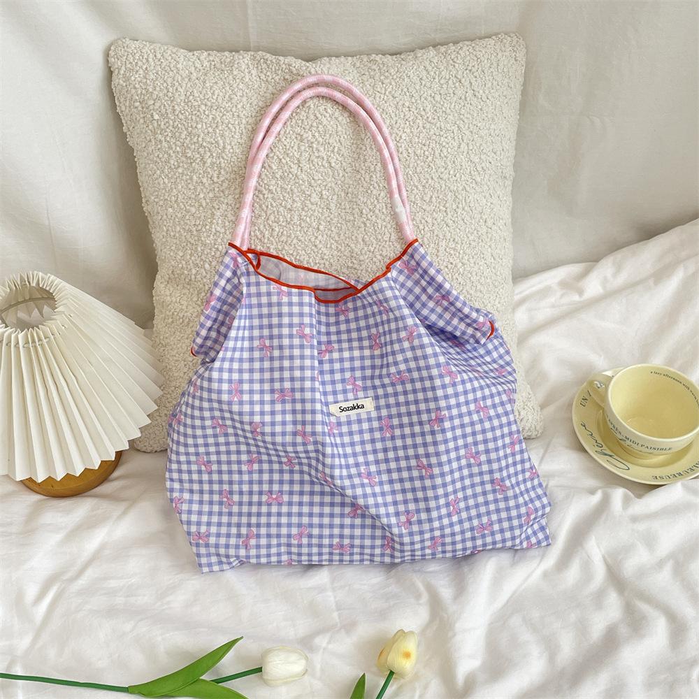 

Summer large-capacity shoulder bag, drawstring shopping bag, fresh bow tote bag, underarm bag.