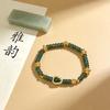 Women's Jade Gourd Bracelet: Elegant Chinese Style with Beaded Coin Design