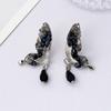 New temperament three-dimensional hollow design crystal butterfly water drop love stud earrings retro versatile high-end earrings women