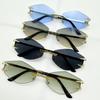 Neue rahmenlose polygonale Sonnenbrille Personalisierte Klauen-Zahn-Dekorationsbrille Outdoor Seaside Street Shooting Shades Brille