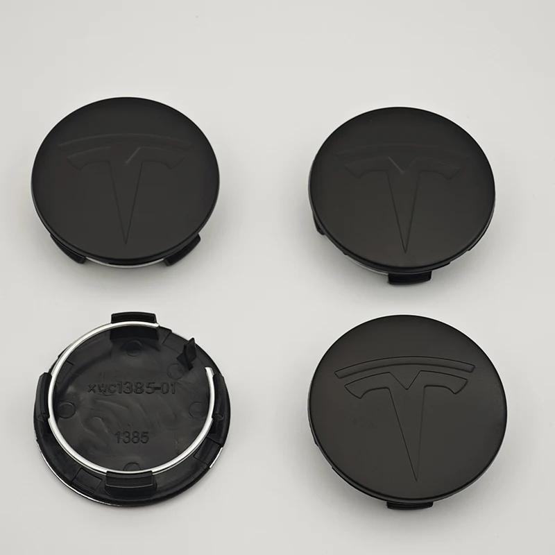 Samolepka na auto 2025 Nové Tesla 4ks ABS 56mm Kryty odznaků Tesla Model 3 Model Y Krytky nábojů Středové krytky kol pro Tesla Model Y X S 202