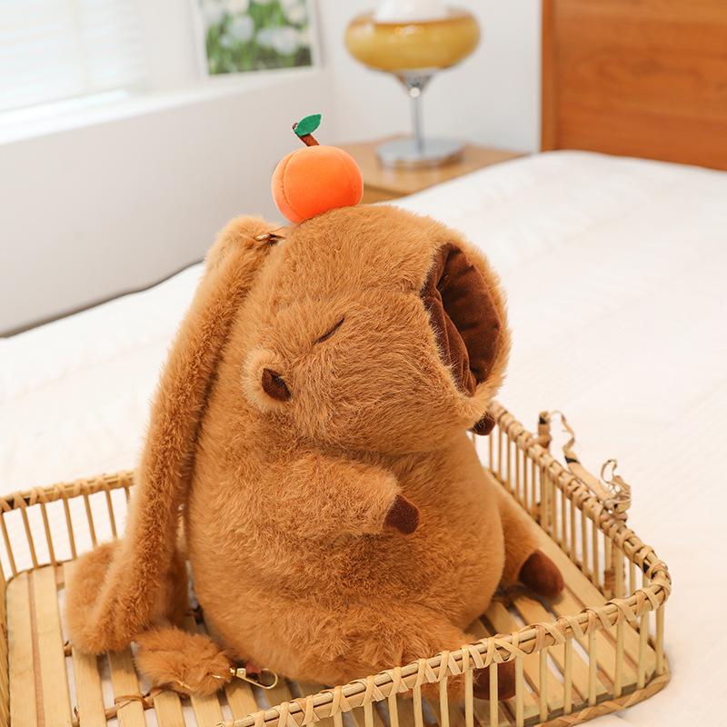 New head orange capybara bag paper drawn plush toy ugly doll kapibara double shoulder doll backpack