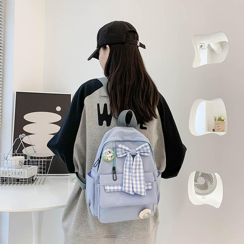 Bow schoolbag Female primary school students Large capacity 3rd to 6th grade high school lightweight weight weight reduction Cute simple backpack