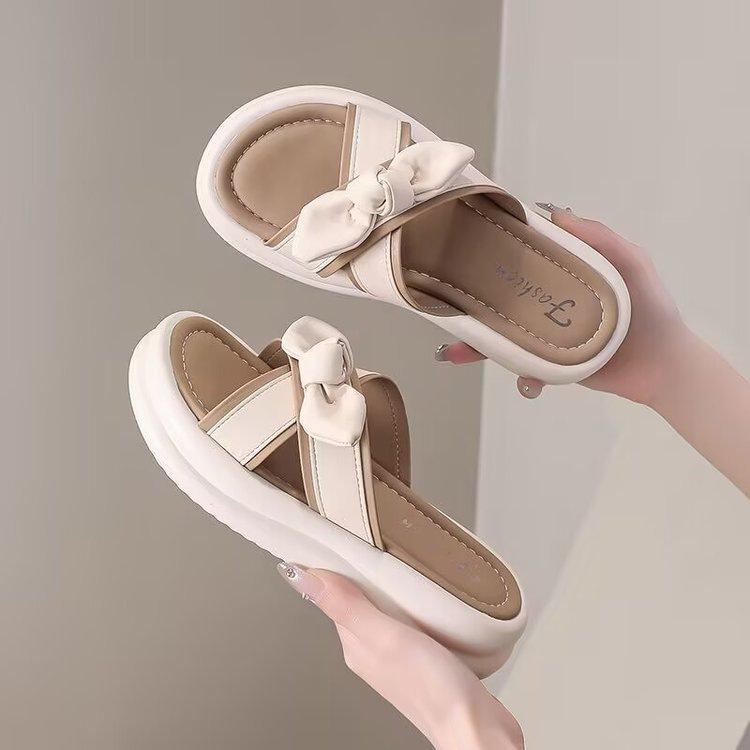 Hausschuhe Sommerkleidung Neujahr neuer Feen-Stil Schleife Muffin-Plateau Strandschuhe Ein-Riemen-Schlappe Ins-Tide