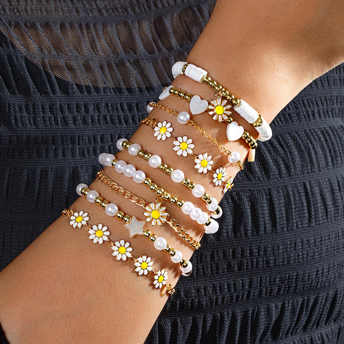 

9-piece Bohemian style oil drop daisy pendant bracelet, multiple layered soft ceramic flower imitation pearl bracelet set
