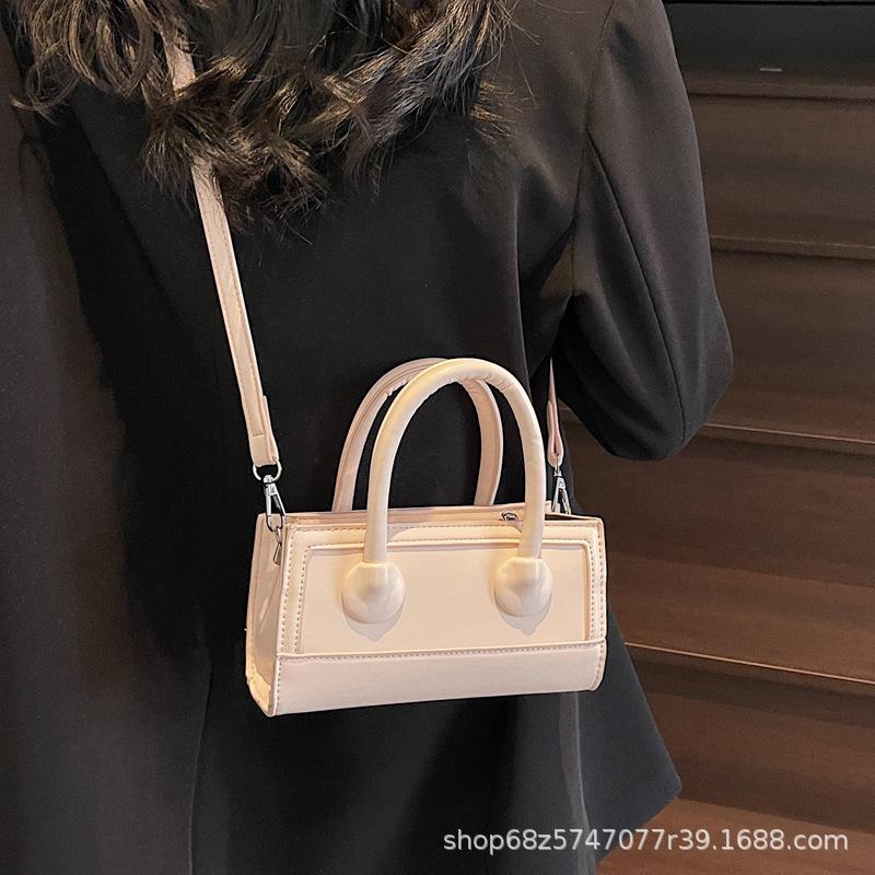 Small fresh and simple hand-held small square bag 2025 spring new Korean fashion trendy shoulder bag high-end crossbody bag