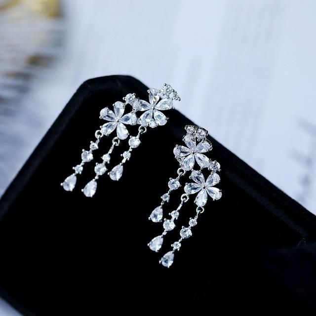 

Корейские модные серьги с кисточками и цветком, разноцветные серьги с фианитом и растением, висячие капли воды, брендовый дизайн, эффектные ювелирные изделия серебряный