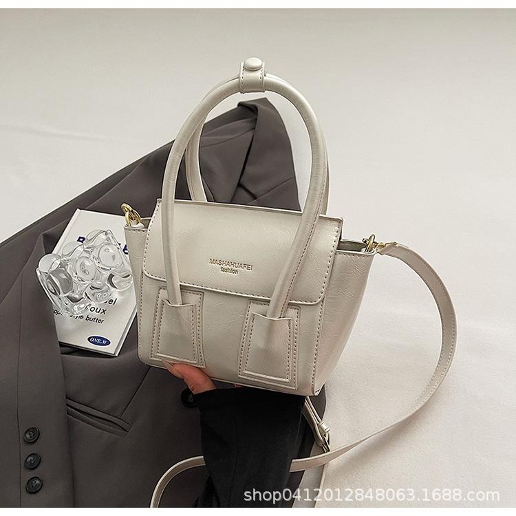 

Нишевый дизайнерский портативный маленький мешок женский 2025 новый модный мессенджер высокого класса сумка-тоут на плечо для поездок на работу