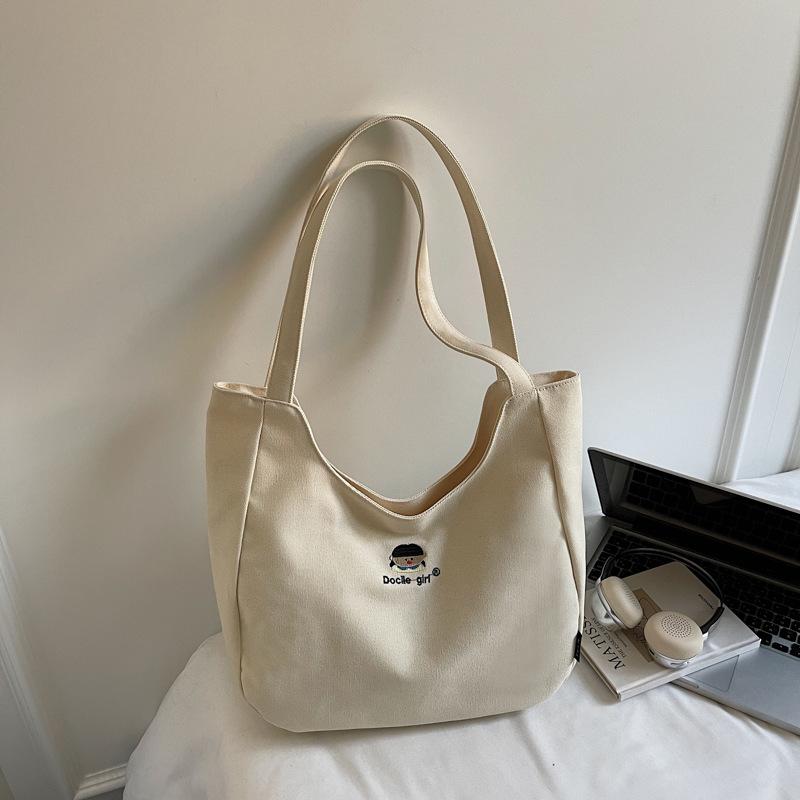 Simple minimalist style large capacity underarm canvas bag 2025 autumn new solid color tote bag embroidered shoulder bag