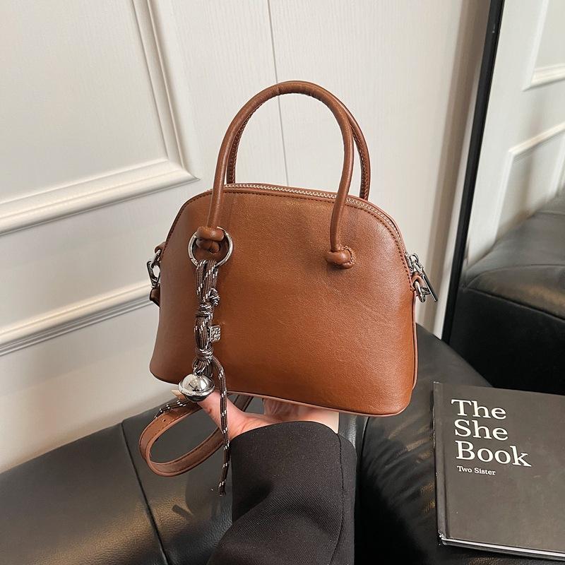 Niche light luxury portable shell bag women's new high-end retro fashion shoulder messenger bag