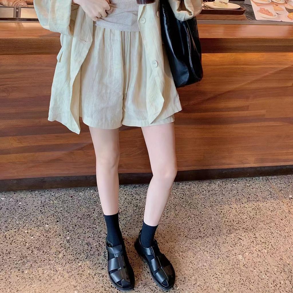 Sheepskin version~ thick-soled woven sandals women's summer one-word buckle belt hollow breathable pig cage shoes flat Roman shoes