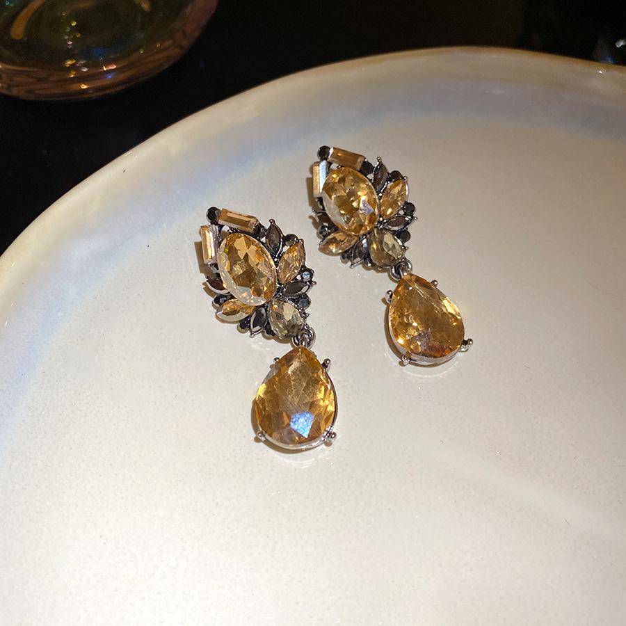 

Silver needle with diamonds, flower water drop fringed earrings, light luxury, high-end earrings, fashionable and gentle earrings, niche design