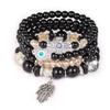 Bohemian Multi-layer Beaded Bracelet with Cross, Evil Eye, Palm Pendants, and Crystals.