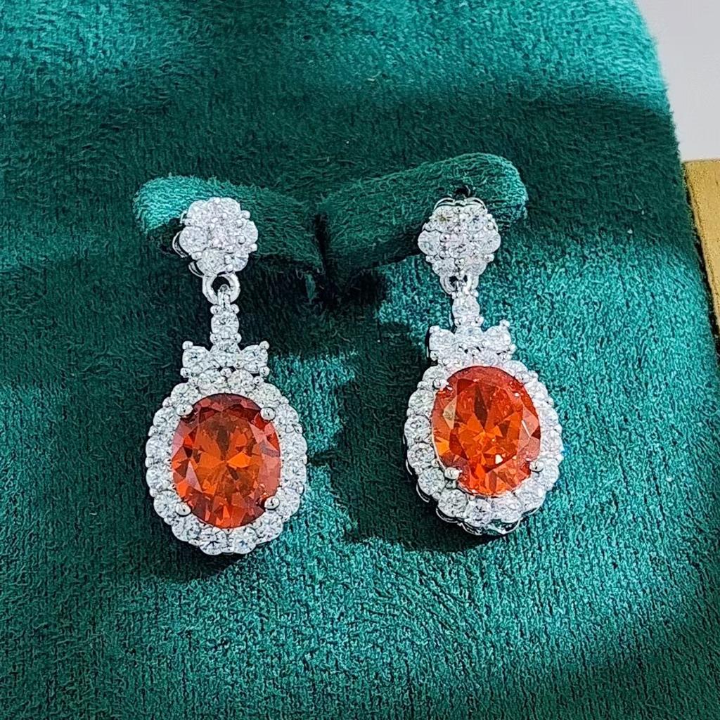 Fashion jewelry: full of diamonds, oval flower studs, exquisite temperament, earrings, light luxury, high-end earrings
