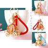 Elegant Cinderella Pumpkin Car Charm Keychain Accessory For Women With Metallic Finish And Colorful Ropes Ideal For Gifts And Special Occasions