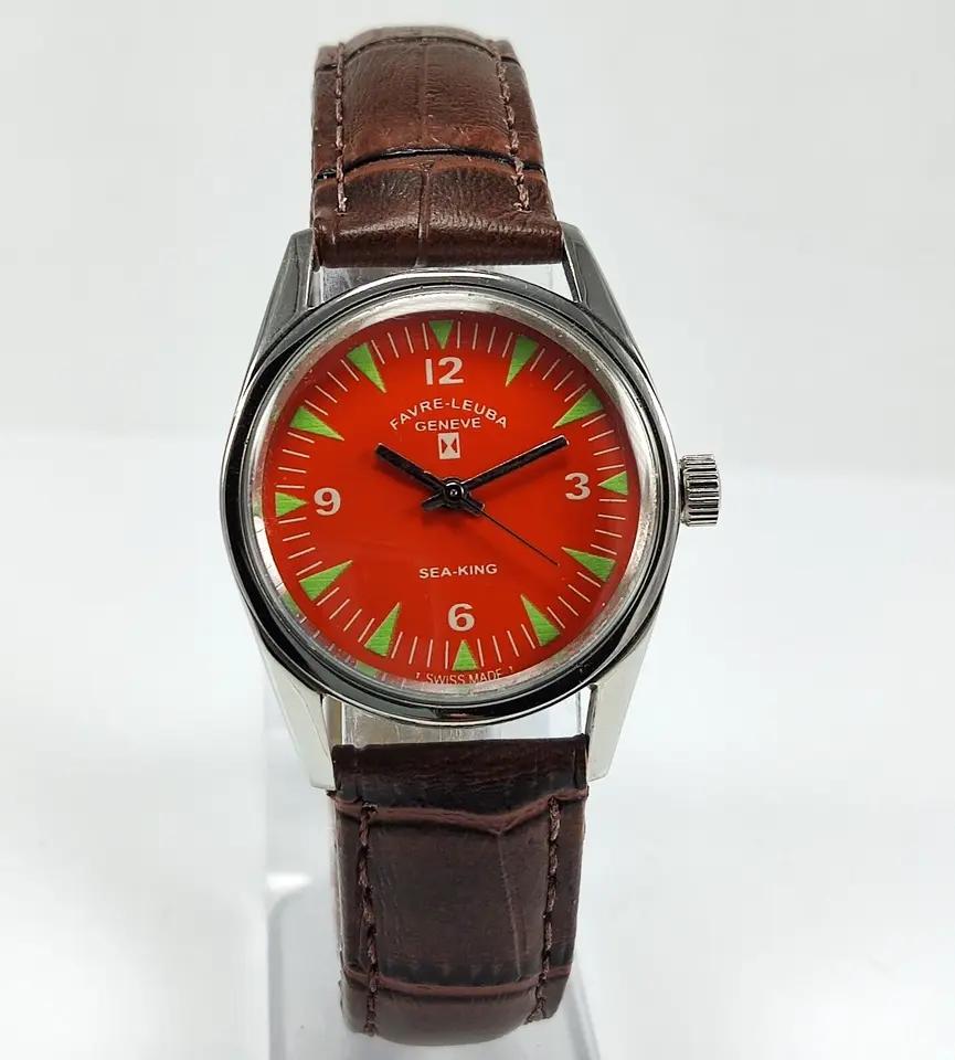 

Винтажные восстановленные наручные часы Favre Leuba Geneve Sea King с оранжевым циферблатом FLC 253 с ручным заводом