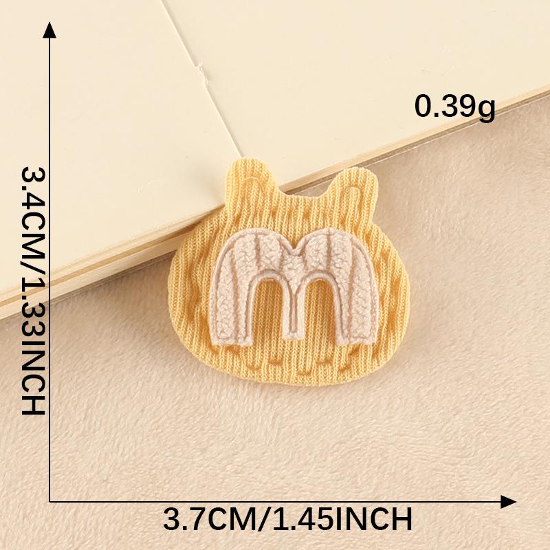 Plush 3D Bow Bear Hairpin with Embroidered Label.
