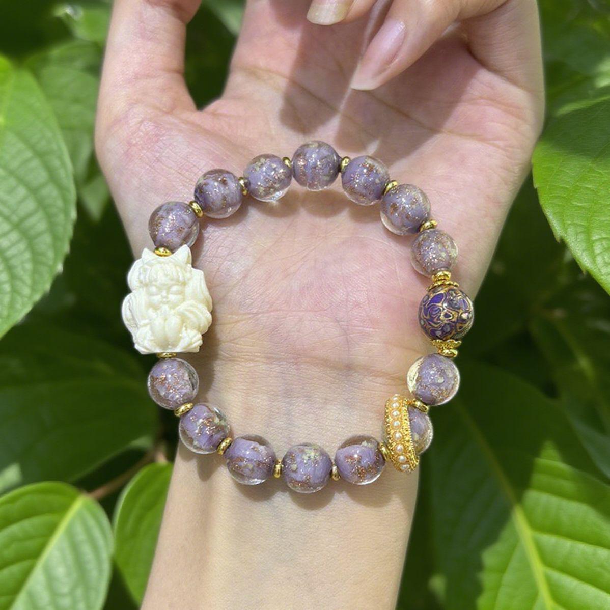 

Temple-Inspired Purple Gold Glass Nine-Tailed Fox Bracelet with Lacquer Beads - Ideal Gift for Radiant Summer Skin.