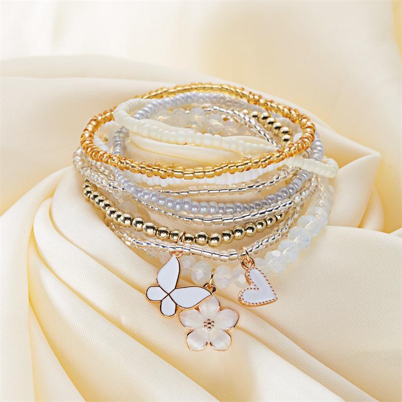 Set da 9 pezzi con Ciondoli a Forma di Farfalla, Fiore, Cuore con Perline, Braccialetti con Catena e Corda Elastica, Gioielli Regalo per Donna