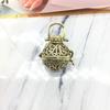 Vintage Style Hollow Round Pendant Necklace Unique Design Metal Alloy Chain Adjustable Length Suitable for Daily Wear and Special Occasions