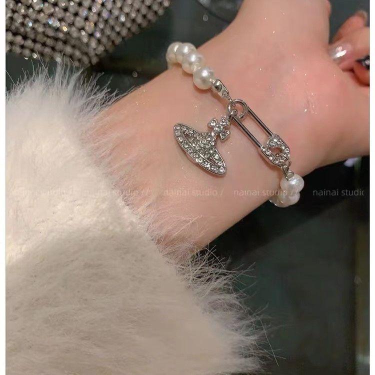 

Жіночий бароковий браслет «Сатурн» зі стразами: Елегантний Нішевий Дизайн Легкої Розкоші