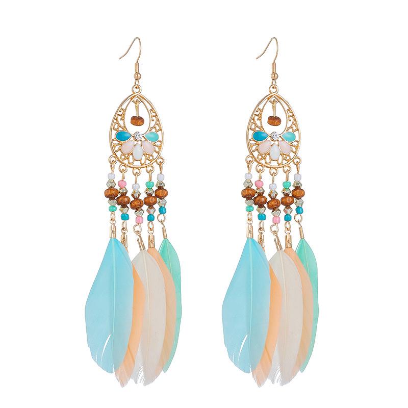 Bohemian Faux Silver Feather Tassel Mosquito Coil Earrings: Summer Retro Ethnic Ear Jewelry