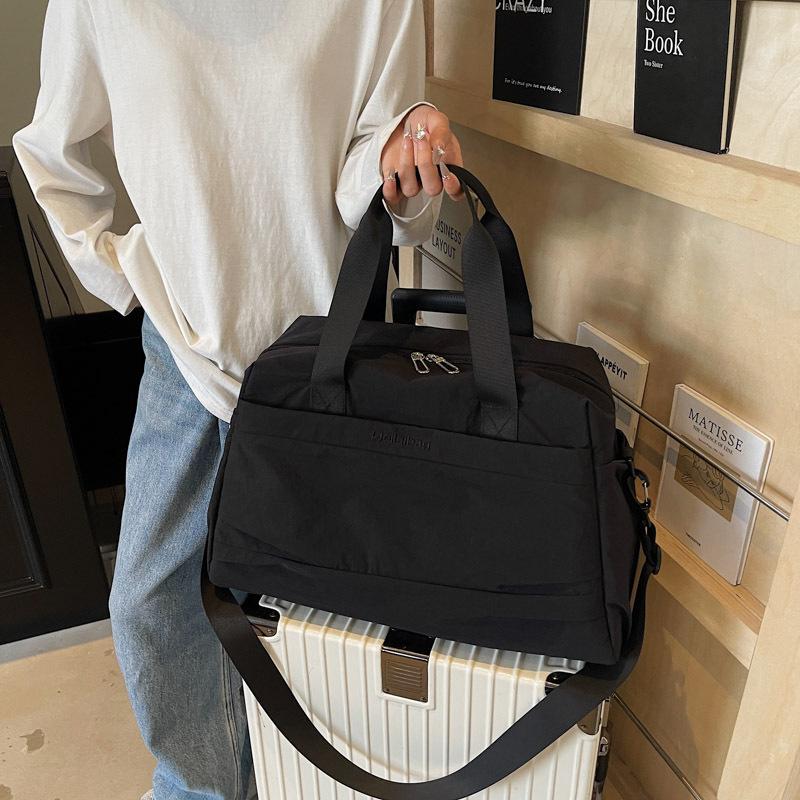 Large capacity travel bag women's fashion lightweight waterproof yoga fitness bag short trip travel luggage bag boarding bag