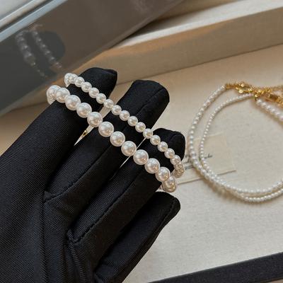 High-End Australische weiße Perlenarmband Damen Barock Retro Leichter Luxus Hirseperlenarmband Exquisite Hand
