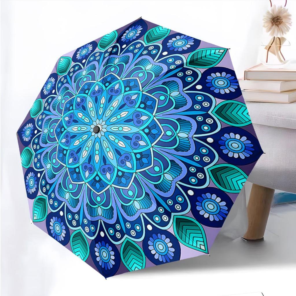 This Umbrella Has an Automatic Folding Mechanism And Showcases a Blue Mandala Design. It'S a Portable And Collapsible Accessor