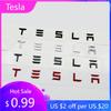 Autómatrica 2025 Új Tesla 3D ABS Szénszálas Króm Fekete Logó Tesla Betűk Embléma Autó Hátsó Csomagtartó Betűk Tesla Model 3 Y X S A-hoz