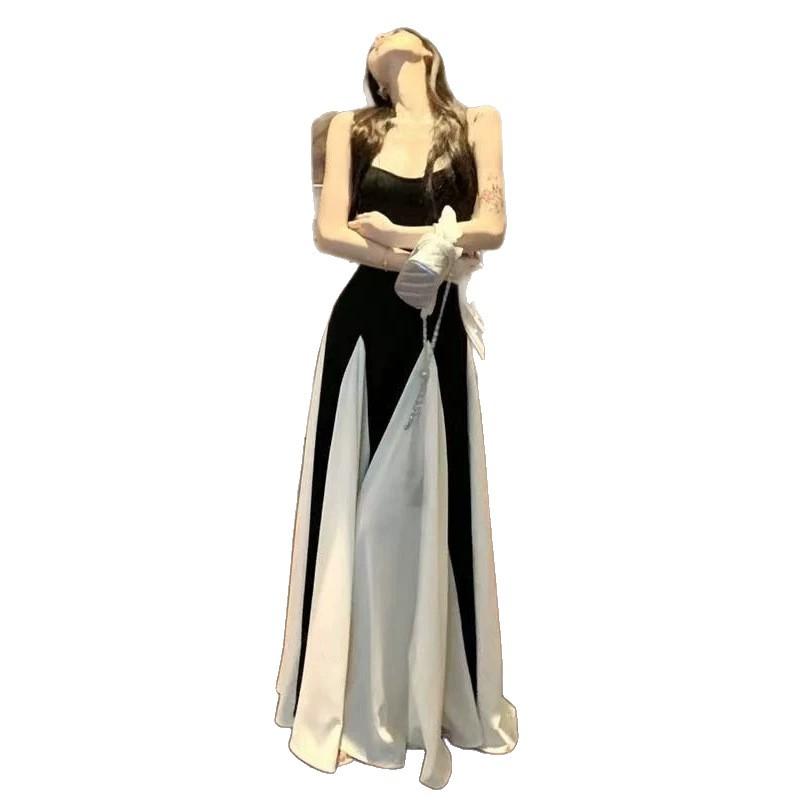 French high-end black and white splicing suspender dress Hepburn style beautiful unique temperament waist a word long dress summer