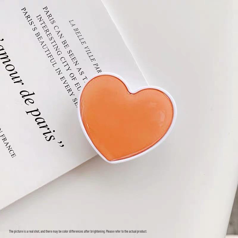 Airbag Heart-Shaped Retractable Phone Holder - Creative Solid Color Gift with Logo