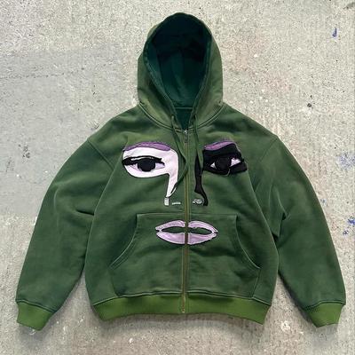 Europäischer und amerikanischer Figur-Patch-Spleiß-Lockerer Punk-Stil Street-Reißverschluss-Kapuzenpullover