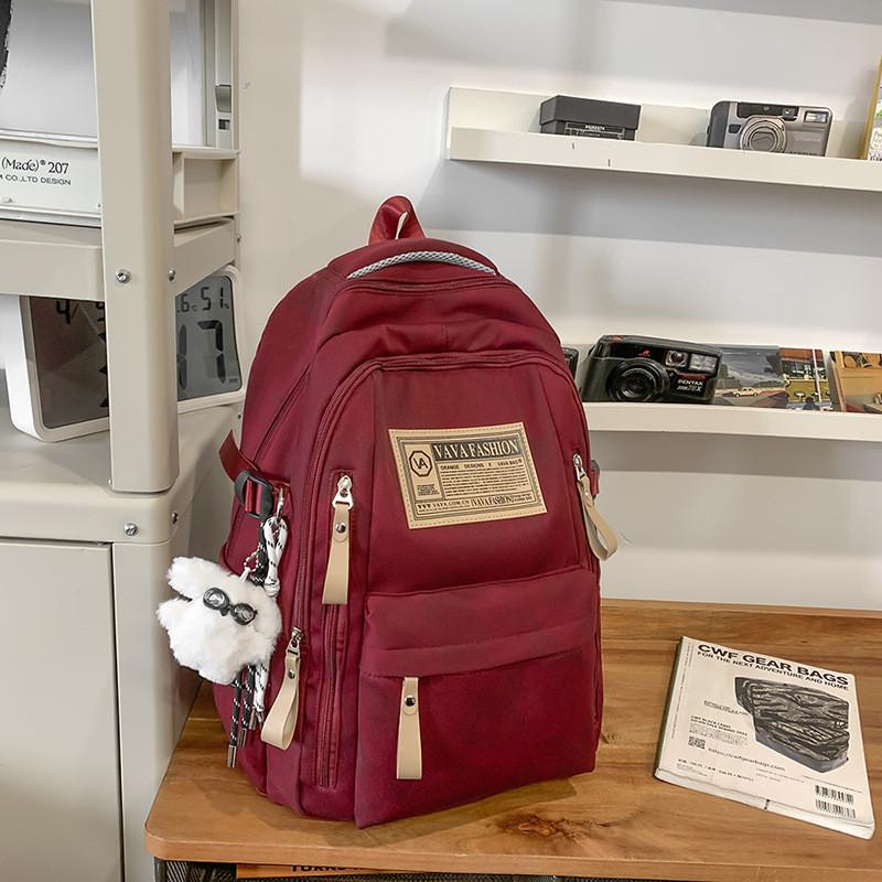 Minimalist Student Backpack With Nylon Material And Comfortable Arc Straps For High School And College Use красный