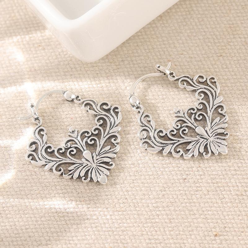 Earrings European and American hollow retro court personality Internet celebrity copper earrings