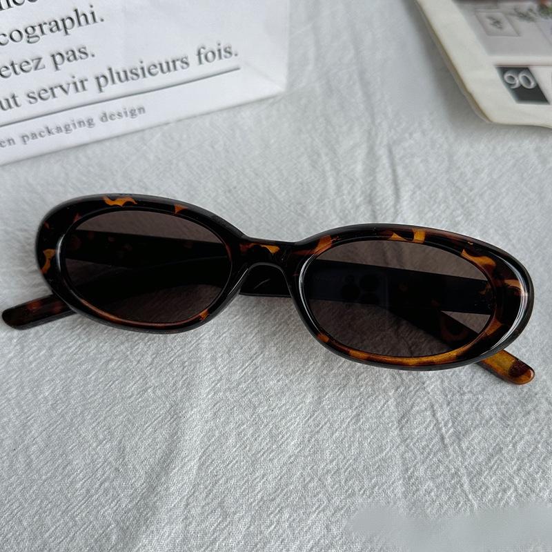 Falling Pool Knitwear Cat Eye Oval Sunglasses - Trendy Women s UV Protective Leopard Print Transparent Frame.