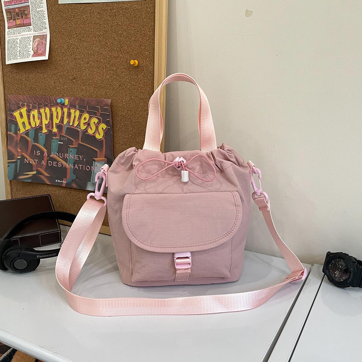 

2025 осень новая корейская нишевая легкая повседневная сумка-мессенджер нейлоновая на шнурке изысканная сумка для поездок на работу ручная сумка розовый