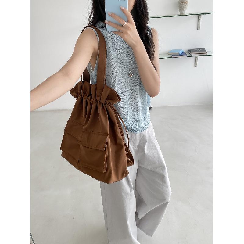 

New travel backpack women s casual dual-purpose shoulder bag women s large-capacity nylon computer school bag women коричневый