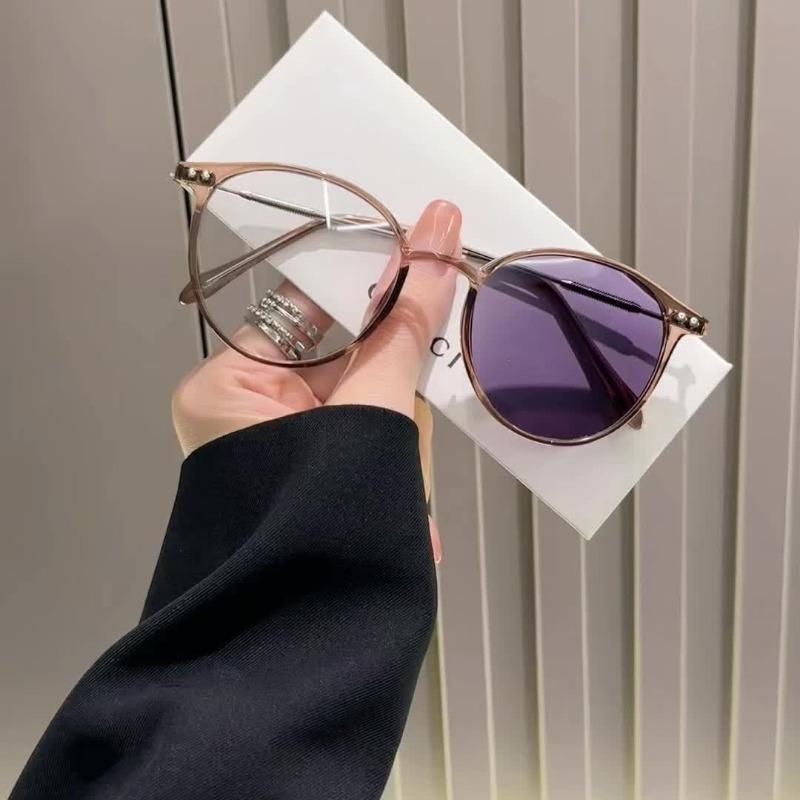 A Pair of Stylish Pochromic Glasses for Women Featuring A Vintage Semi Metal Frame Classic Minimalist Design