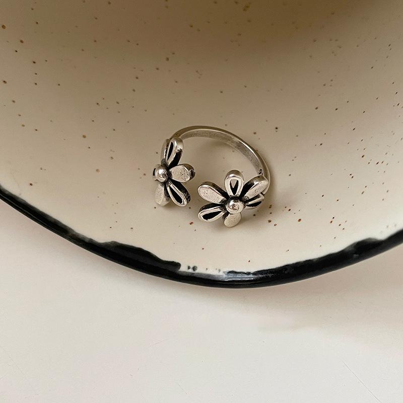 Hollow round double flower opening ring, fashionable and simple cold wind index finger ring, personalized niche design ring