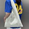 Cross-border first-layer cowhide commuter large-capacity women's bag zipper triangle bag versatile portable shoulder lazy wind underarm bag